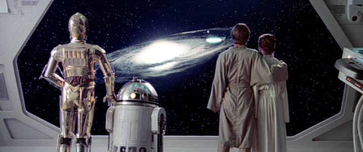 From left to right: C3PO (Anthony Daniels), R2D2 (Kenny Baker), Luke Skywalker (Mark Hamill) & Princess Leia Organa (Carrie Fisher) look towards an unknown future in 